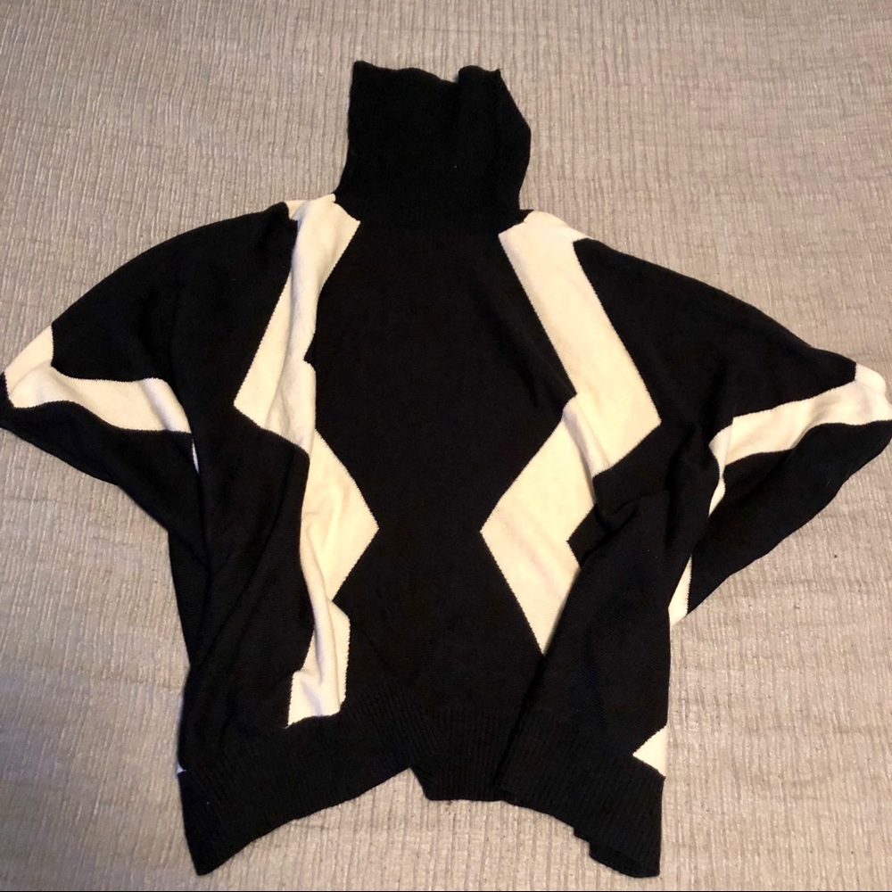 Poncho with high neck